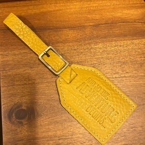 Portland leather goods mystery box yellow luggage tag